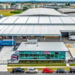 Side aerial view of 13 Hautu Drive, a completed Quadrant Properties project.