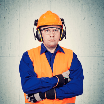 Australian construction worker in safety PPE using SWMS management tools to manage Safe Work Method Statements across construction sites.